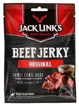 Balení sušeného hovězího masa Jack Link's Beef Jerky Original s informacemi o 100% libovém hovězím a vysokém obsahu bílkovin, vedle kousků masa a sklenice omáčky. Hmotnost 25 g