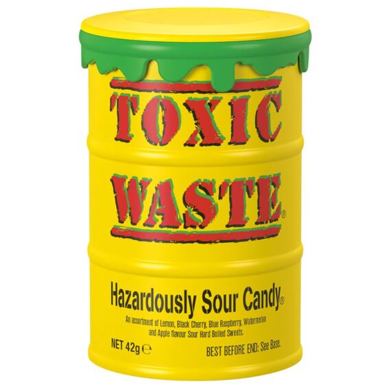 Žlutá kovová nádoba s nápisem "TOXIC WASTE" obsahující extrémně kyselé bonbóny s příchutěmi citronu, černé třešně, modré maliny, melounu a jablka. Hmotnost 42 g